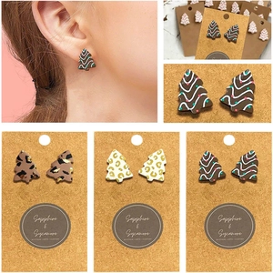 Handmade Christmas tree stud earrings for women featuring colorful resin holiday designs