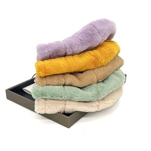 Detail showing the fluffy texture and vibrant colors of the plush rabbit fur bucket hats