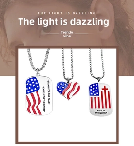 Detailed view of three USA flag themed necklaces with heart and dog tag enamel pendants