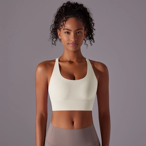 Vista frontale del reggiseno sportivo avorio con scollo a U e orlo largo di supporto