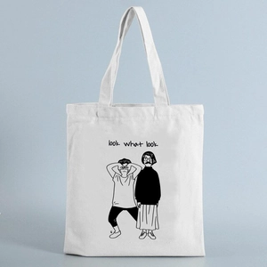 White canvas tote bag for women featuring black line art print and look what look text