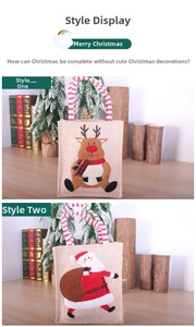 Détail de sacs de Noël en toile de jute avec motifs 3D de renne et de Père Noël brodés