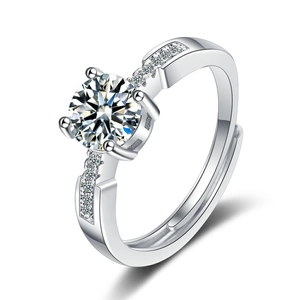 Sparkling zircon open ring with a round center stone and pave diamond accents on band
