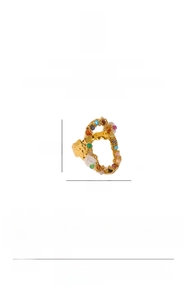 Detailed view of baroque style gold steel ring with freshwater pearls and gemstones