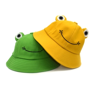 Cute frog-shaped fisherman hats in yellow and green cotton canvas with happy embroidery