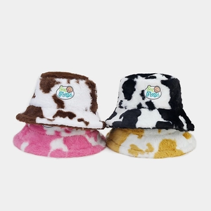 Cute cow print plush bucket hat with Sea Breeze embroidery in four stylish winter colors