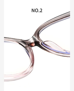 Close-up of lavender purple clear eyeglass bridge and integrated nose pads detail