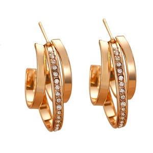 Gold-tone geometric C-shaped hoop earrings with sparkling rhinestones in a triple-layered design