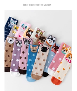 Close-up of colorful knit socks featuring assorted cute cartoon animal patterns