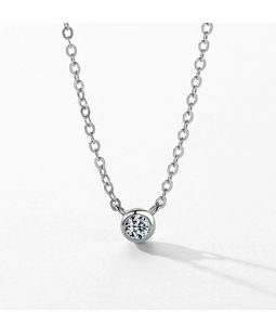 Detailed close-up of a S925 silver necklace featuring a bezel-set round zircon pendant