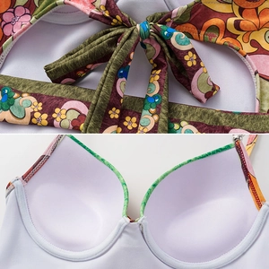 Detail of adjustable back tie and white padded cups on a bohemian floral swimsuit