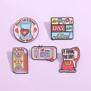 Set of 5 colorful enamel brooches with vintage telephone and matchbox creative designs