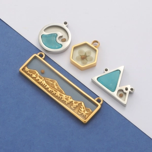 Detailed set of geometric stainless steel pendants with resin flower and mountain designs