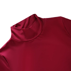 Detail of red stand collar and smooth polyester fabric texture on long sleeve dress