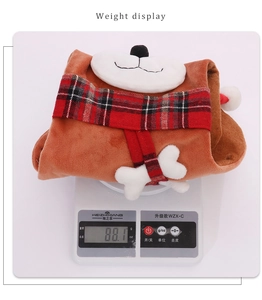 Weight display of 88.1g for a plush dog-shaped Christmas stocking with plaid scarf