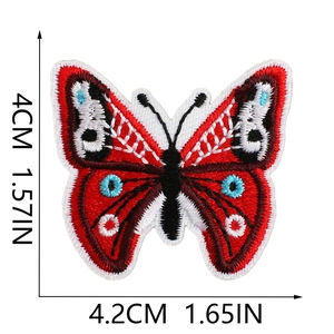 Detailed view of blue and red embroidered butterfly patch with precise size measurements