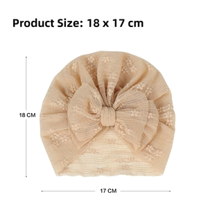 Detailed dimensions of beige baby turban with lace texture and large bow detail