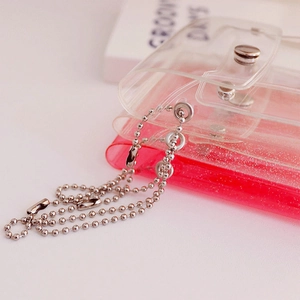 Set of two clear and glitter pink PVC mini card holders with silver ball chains