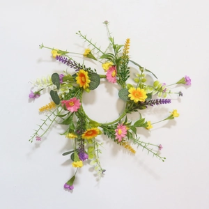 Artificial floral wreath with colorful wildflowers and linen bow for home wall decor
