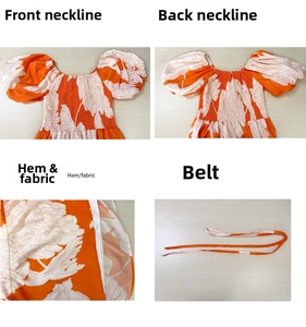 Détail de l'encolure à épaules dénudées, manches bouffantes et ceinture fleurie
