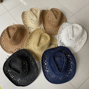 Handmade straw cowboy hats in various colors with hollow design for sun protection