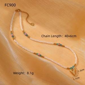 Beaded necklace with heart pendant on golden fabric, stainless steel 40+6cm jewelry