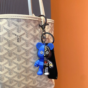 Mechanical robot bear keychain with blue and black-gold split design on white tote bag