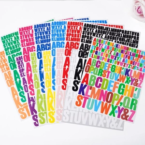 Macro detail of multi-colored vinyl alphabet stickers with various fonts and sizes