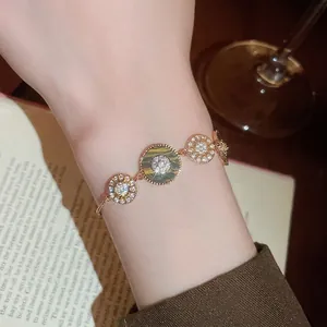 18K vergoldetes Armband mit Tigerauge und funkelnden Zirkonia-Anhängern für Damen