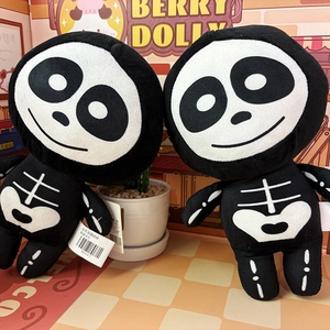 Detailed view of two 8-inch cute Halloween skeleton plush dolls with white bone patterns