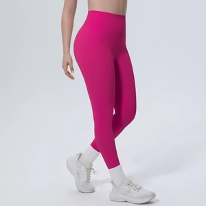Detail der High Waist Yoga Leggings in leuchtendem Magenta mit nahtlosem Bundgewebe