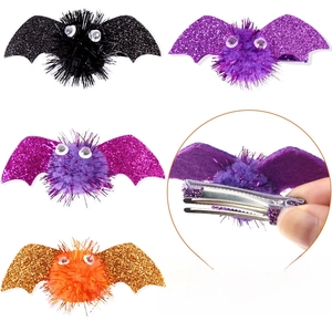 Detailed side view of Halloween bat hair clips showing the metal alligator clip attachment