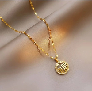 Gold plated stainless steel Fu character pendant necklace with crystal circle on beige silk