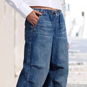 Women's vintage wide leg denim jeans in deep blue wash with drawstring waist and cargo stitching