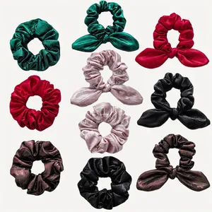 Christmas bow scrunchie set in satin fabric with 10 assorted festive colors and patterns