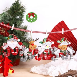 Detailed view of Christmas fabric ornaments including Santa, Reindeer, Snowman, and Bear