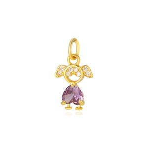 Macro shot of gold girl pendant with heart-shaped purple stone and micro zircons