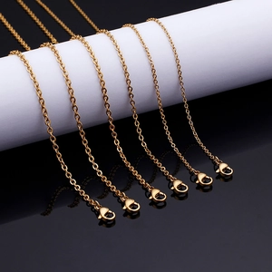 Gold stainless steel punk chain necklace with lobster clasp shown on white display