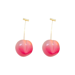 Cute pink resin peach drop earrings with gold long metal pins on white background