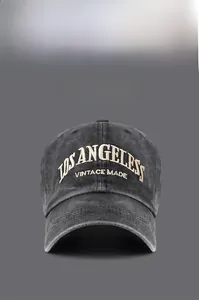 Detail of Los Angeles 3D embroidery on washed vintage dark grey cotton baseball cap