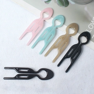 Minimalist U-shaped hair fork set in pink, light blue, beige, and black colors
