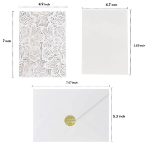 White laser-cut floral wedding invitation set with dimensions and gold invitation seal