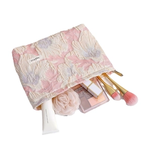 Pink embossed floral makeup bag with large capacity and zipper for travel toiletries