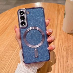 Close-up of blue glitter phone case with silver magnetic ring and purple edges
