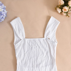 Detailed view of white striped texture fabric on a sexy square neck backless dress