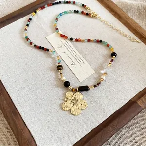 Retro resin bead necklace with multicolor beads and golden flower pendant