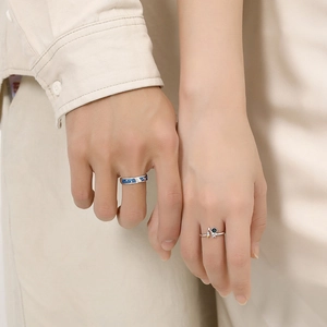 Astronaut couple rings set with blue starry glass and sparkling zircon stones in silver