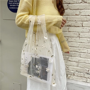 Chic white mesh tote bag with 3D floral embroidery and green vines for summer style