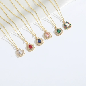 Vintage modernist teardrop pendant necklace in six colors with cubic zirconia halo and gold chain