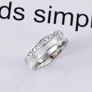 Fashionable stainless steel ring with half-circle square-cut zircons and shell finish